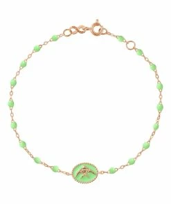 GIGI CLOZEAU Bracelet Poisson Ange Perles Résine Or Rose